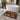Bathroom with a patterned rug, bathtub, and plant