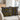 Two black and yellow patterned pillows on a beige sofa.