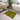 Colorful patterned rug on a bathroom floor with a modern setup.